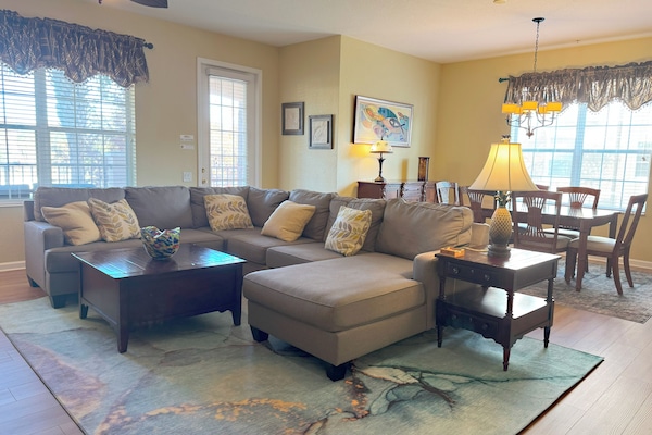 Spacious living room with comfortable sectional couch.