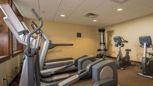 A fitness center with treadmills, elliptical machines, and stationary bikes. - 🎿 Ski-In\Out Penthouse. Sunrise 🌅 Mtn ⛰️ Views. Snowshoe’s Most Luxurious Lodge 🌅 (Snowshoe)