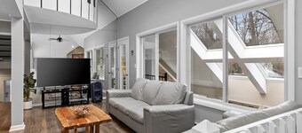 Modern Creek-front House with Volleyball court in the backyard.