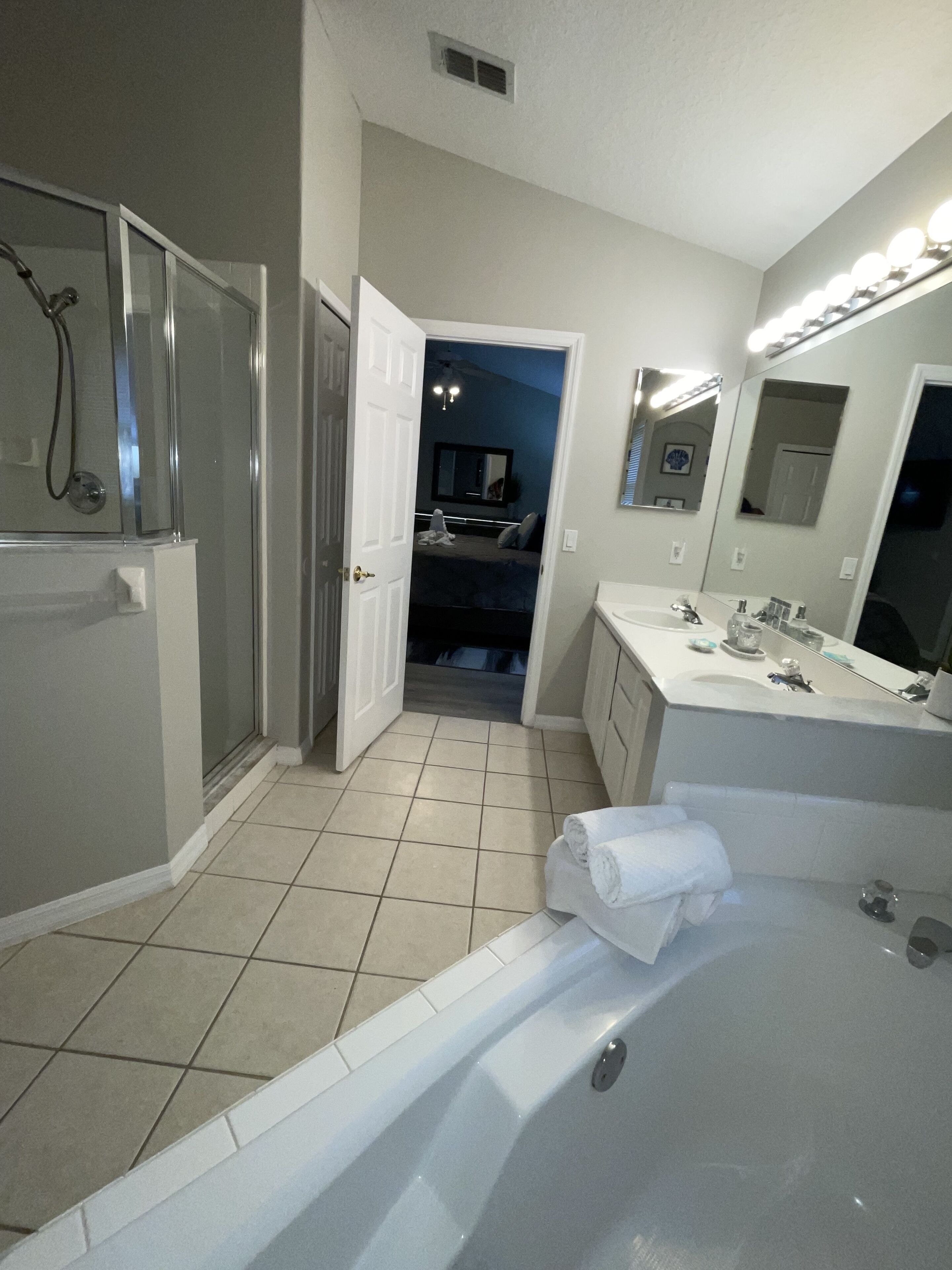 Combined shower/bathtub, hair dryer, towels, soap