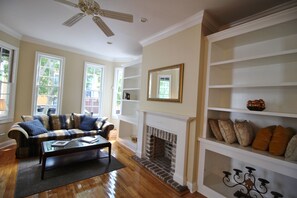TV, fireplace, books
