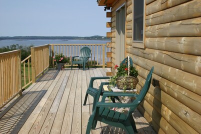 Elegant log home with unobstructed ocean views