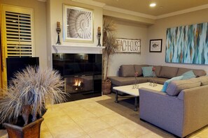 Smart TV, fireplace, books