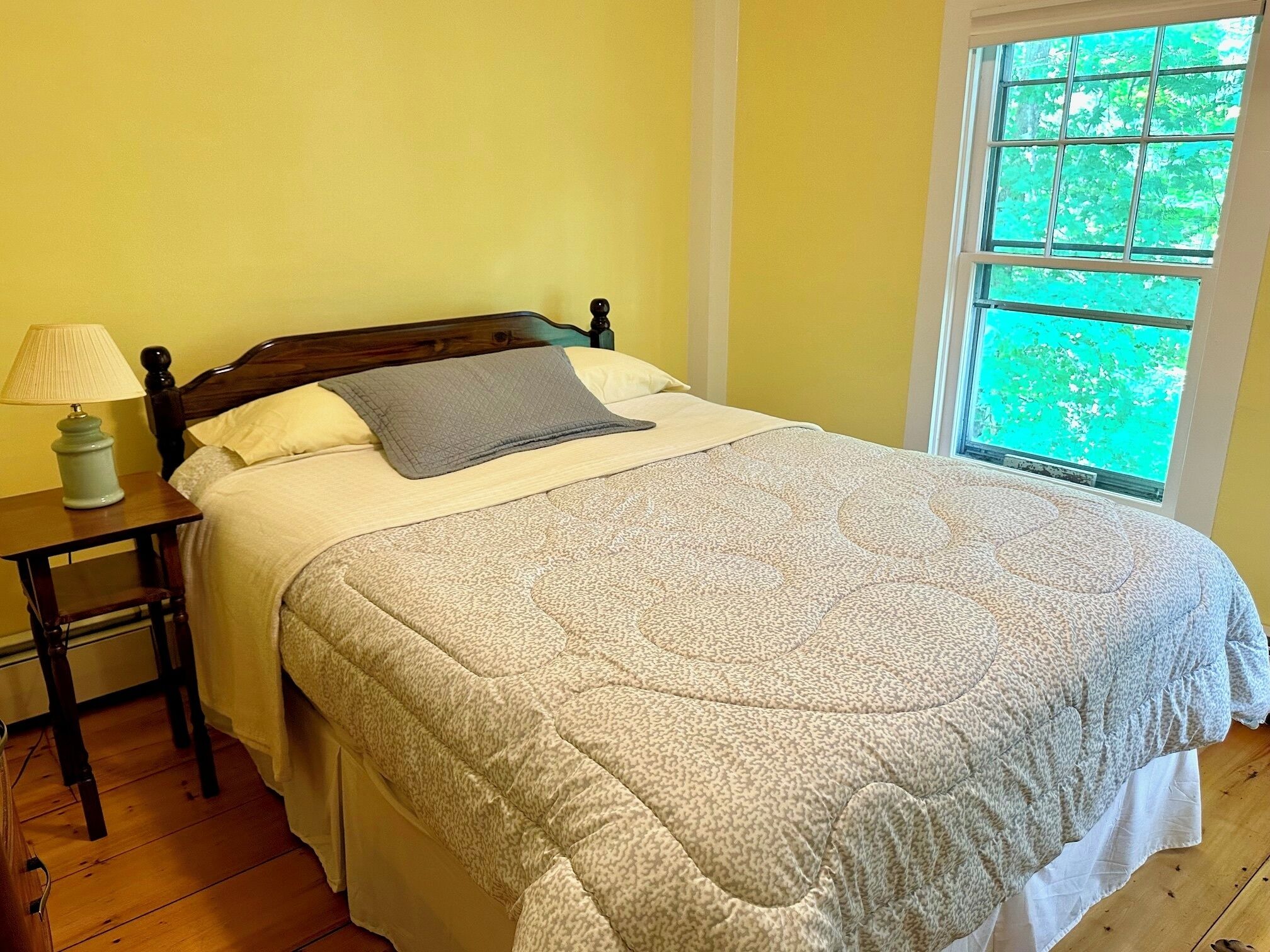 Corner yellow bedroom