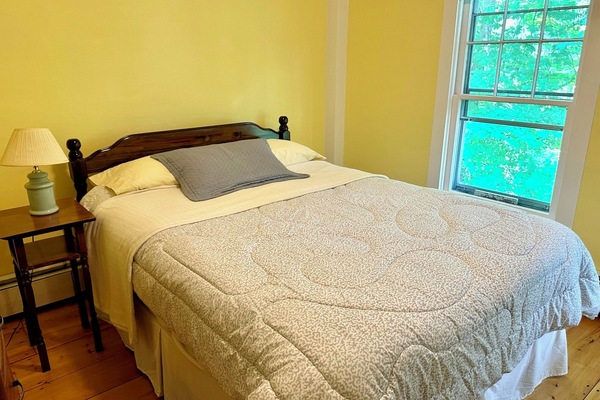 Corner yellow bedroom
