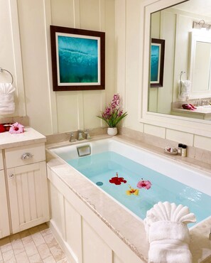 Bathtub, hair dryer, towels, soap