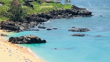 On the beach, sun loungers, beach umbrellas, beach towels