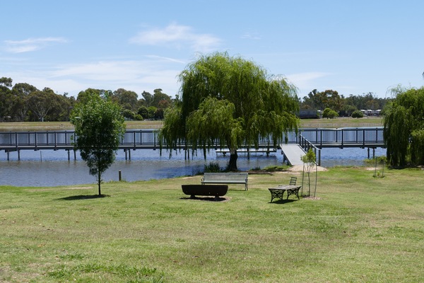Relax around the fire pit and watch the sun set over the lake.