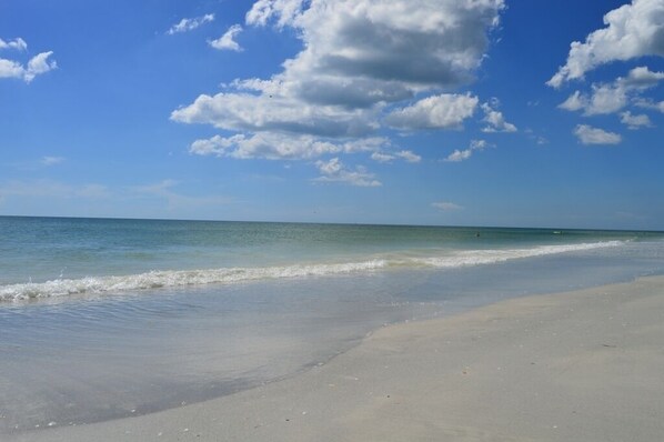 On the beach, sun-loungers, beach towels
