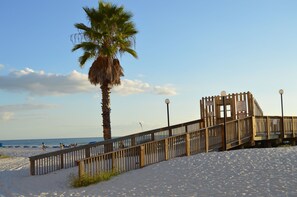 On the beach, sun-loungers, beach towels