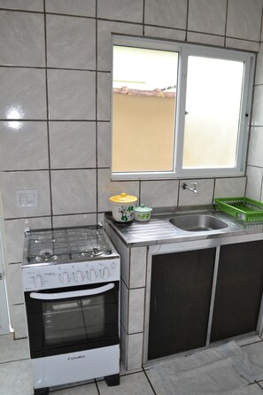 Fridge, microwave, cookware/dishes/utensils