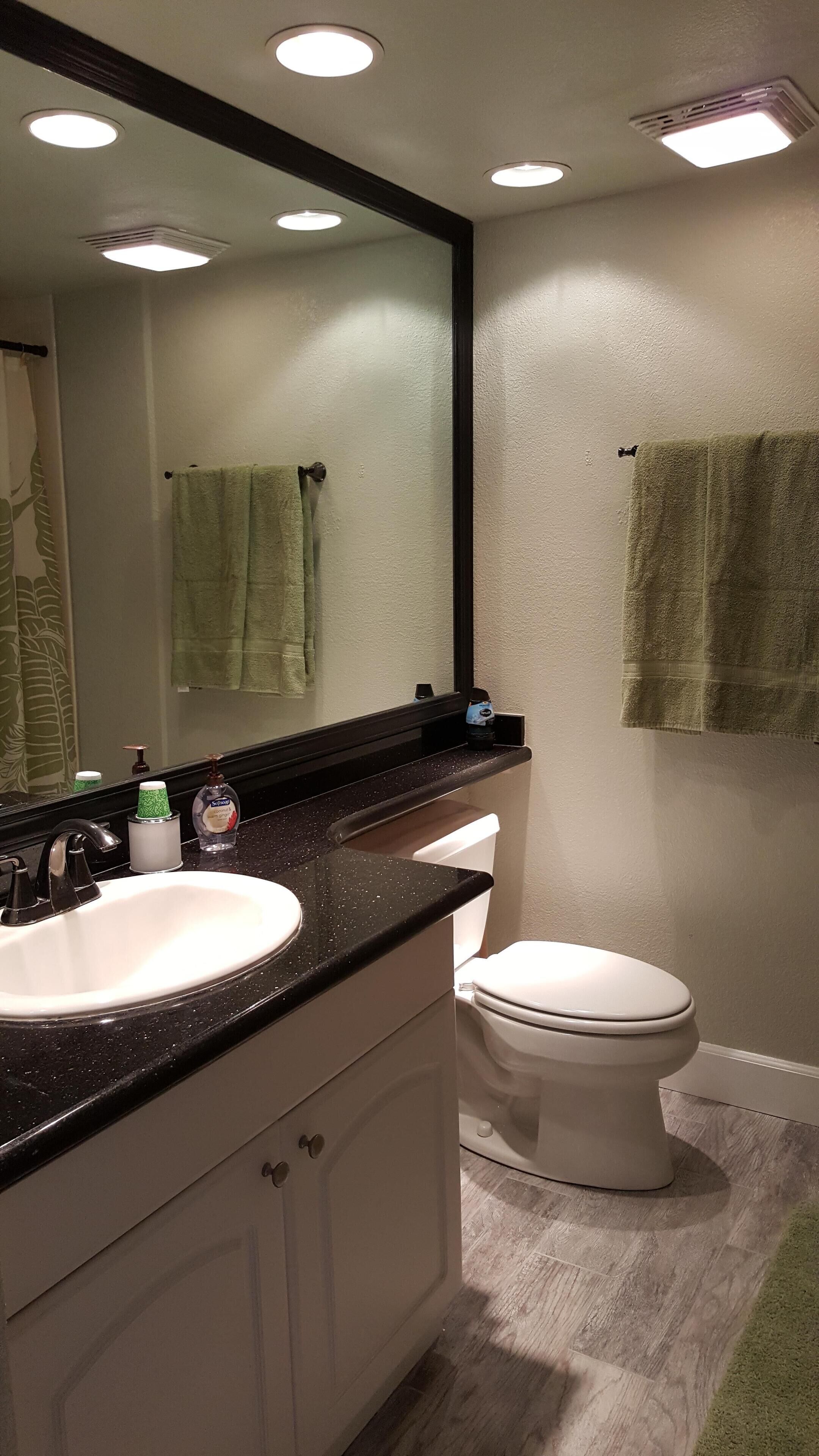 Combined shower/tub, hair dryer, towels, soap