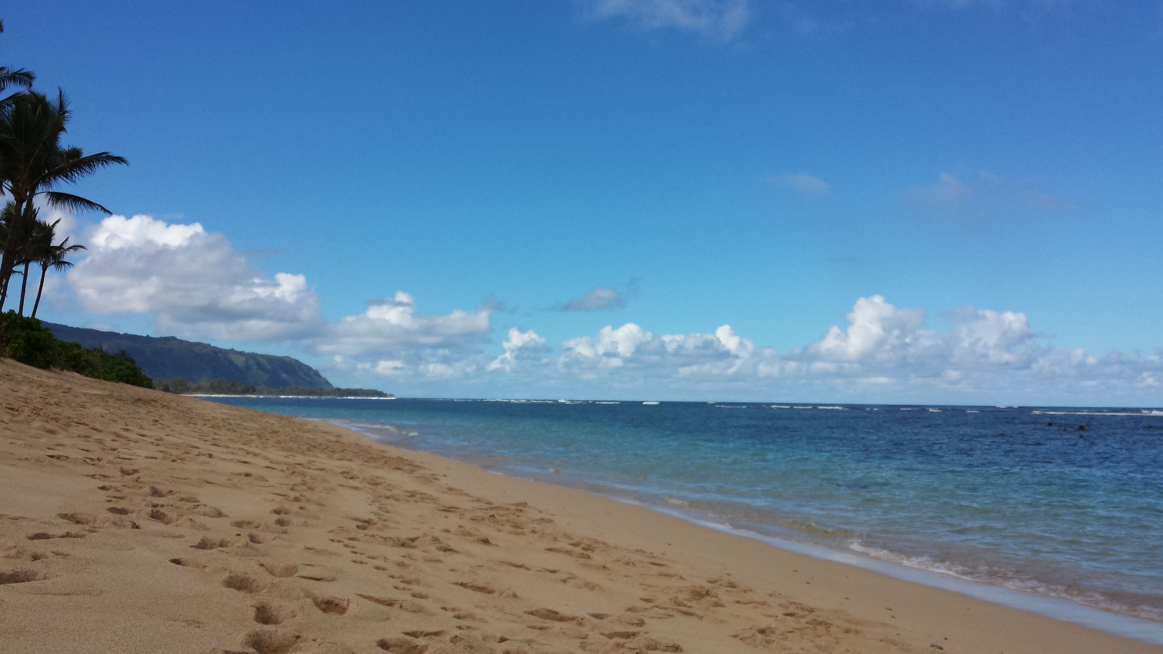 On the beach, sun loungers, beach towels