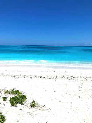 On the beach, sun-loungers, beach towels