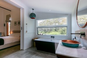 Bathtub, hair dryer, towels