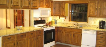 Island Lake Redwood Cottage With Canoe and Grill:  Relax, Swim, Fish, Ski, Enjoy