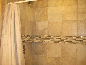 Combined shower/bathtub, hair dryer, towels - Island Lake Redwood Cottage With Canoe and Grill:  Relax, Swim, Fish, Ski, Enjoy (Fort McCoy)