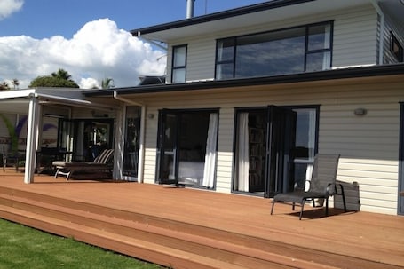 Exterior. Absolute Waterfront Serenity- with small kitchen - only 1 hour from Auckland