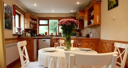 Rusheens Cottage. Charming comfortable cottage with sauna in peaceful valley.