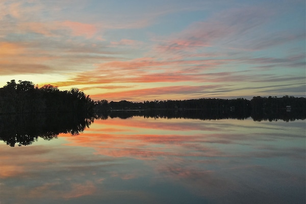 Gorgeous sunset view over glass-like lake!