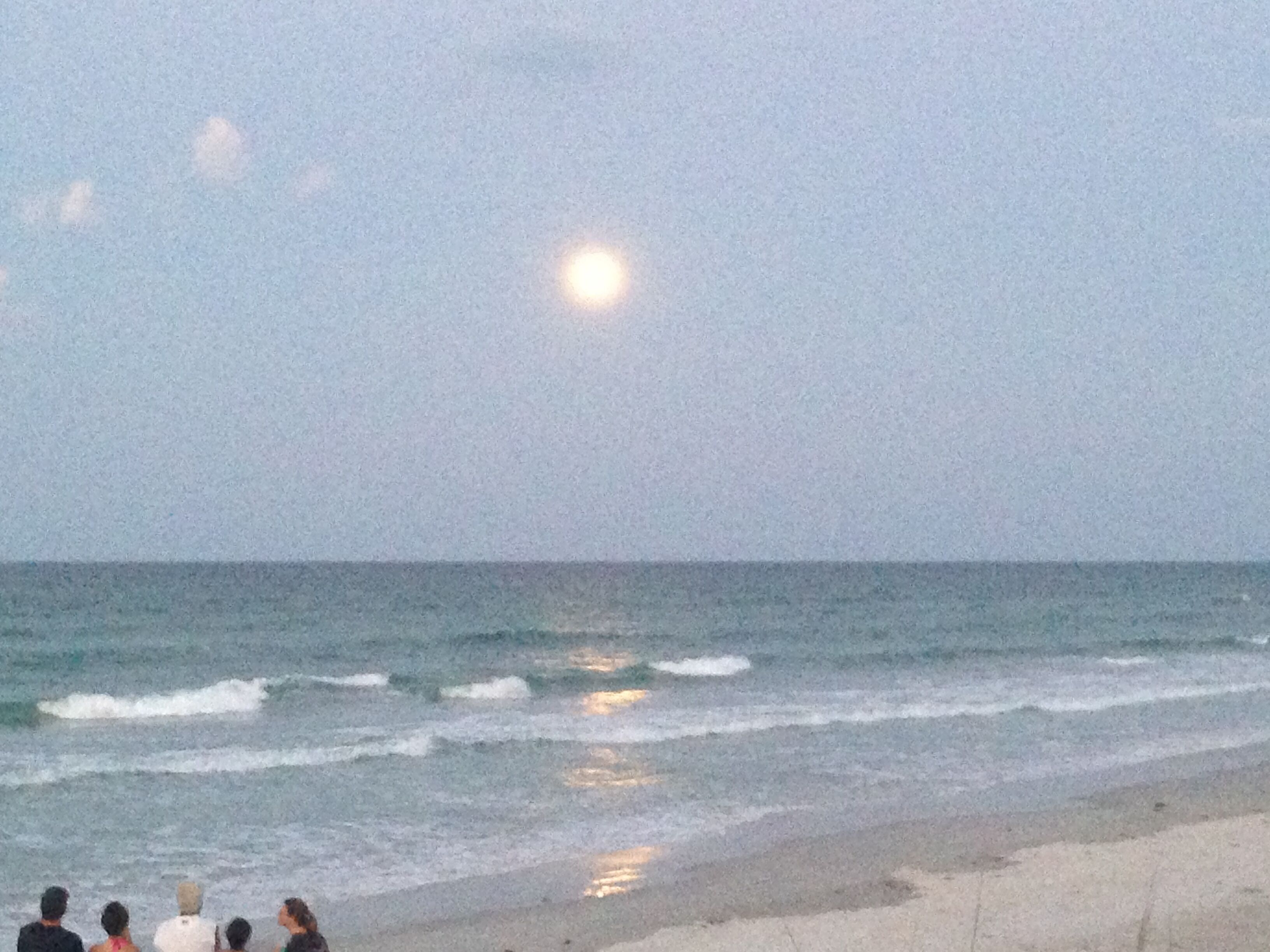 Full moon rising over the Atlantic Ocean