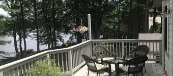 Private 200 feet of lakefront, giant backyard, firepit, canoe, kayaks & more!