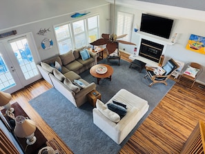 Flat-screen TV, fireplace, DVD player, books - 5 Bedroom Canal Cottage - 2 Min Walk To Beach Access - Boat Dock, Hot Tub, Kayak (Ocean Isle Beach)