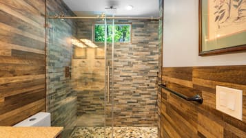 Shower, hair dryer, towels, toilet paper