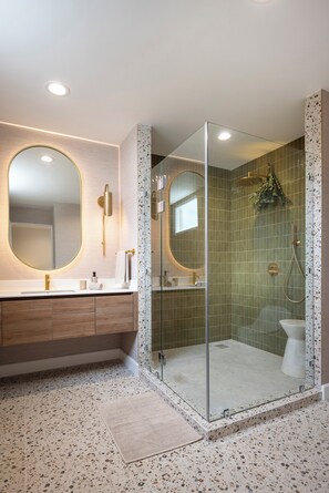 Shower, hair dryer, towels, soap