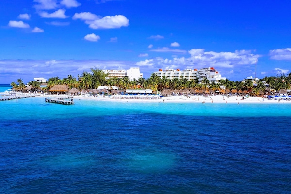 Una playa cerca, toallas de playa