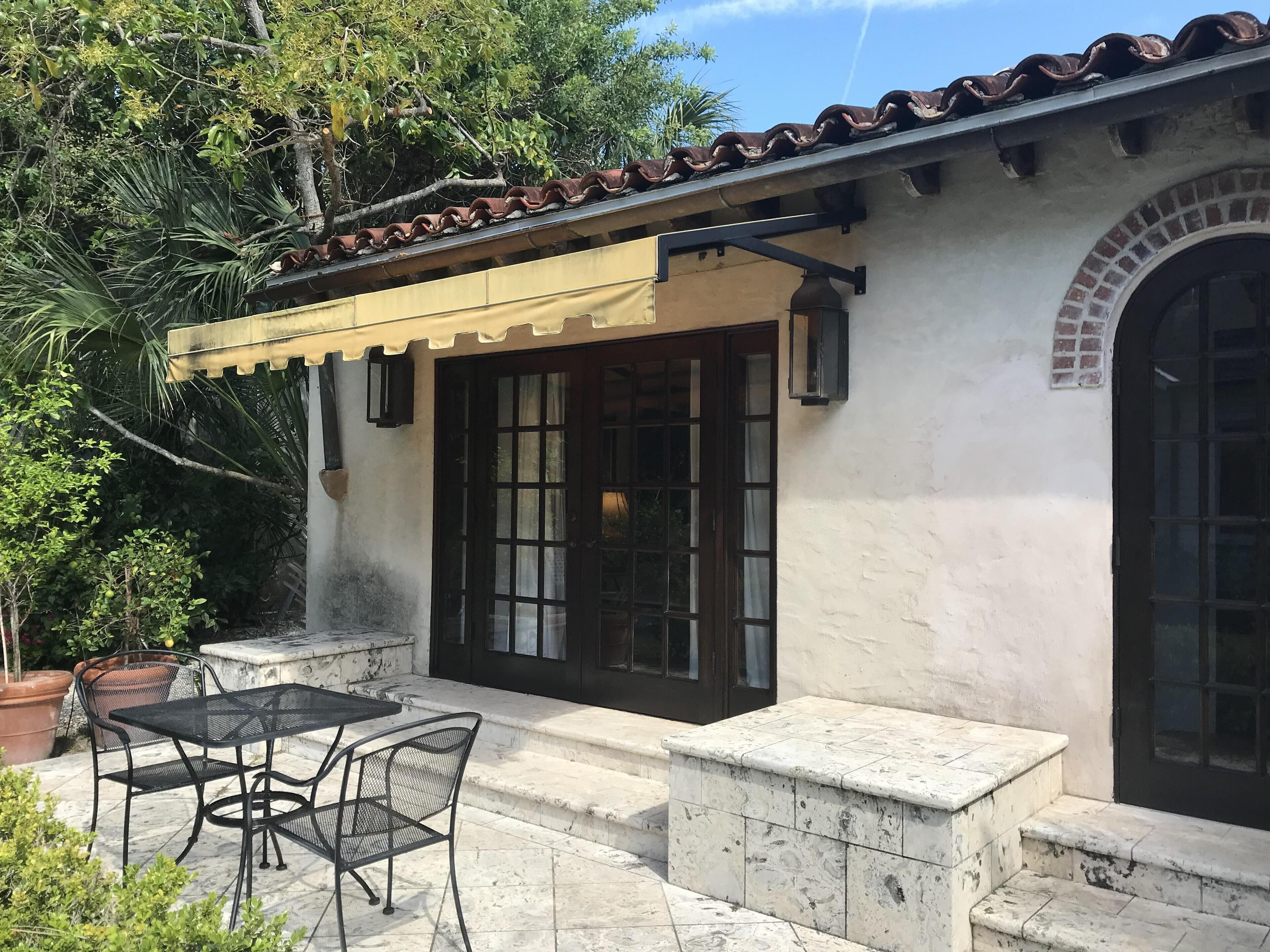 Another view of front of casita with patio table and chairs