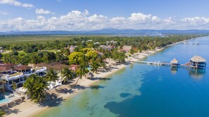 On the beach, sun-loungers, beach towels - Luxury, Beachfront, Home with Resort-amenities, Housekeeping & FREE GOLF CART. (Hopkins)