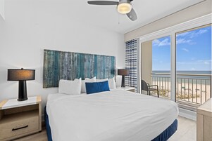 Premium bedding, laptop workspace, blackout curtains, iron/ironing board