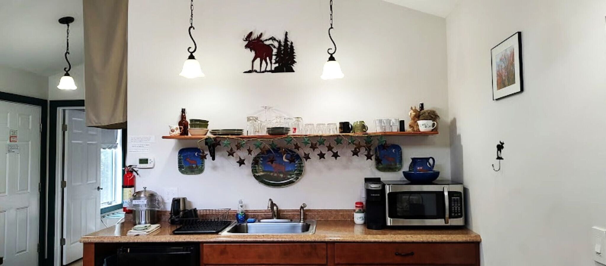 Frigorifero, microonde, piano cottura, macchina per tè/caffè