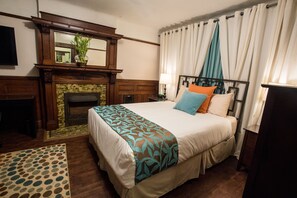 1 bedroom, desk, iron/ironing board, travel crib