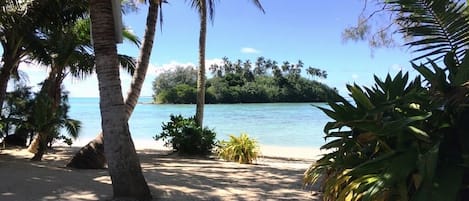 On the beach, sun-loungers, beach towels