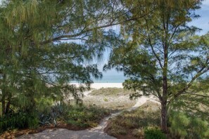 On the beach, beach towels - On the Beach.......step off the deck onto the sand! Wide open views of the Gulf! (Treasure Island)