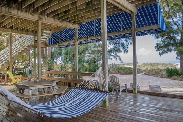 Outdoor dining - On the Beach.......step off the deck onto the sand! Wide open views of the Gulf! (Treasure Island)