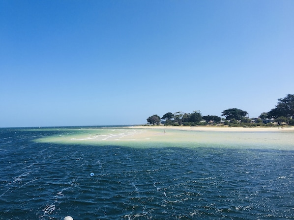 On the beach, sun loungers