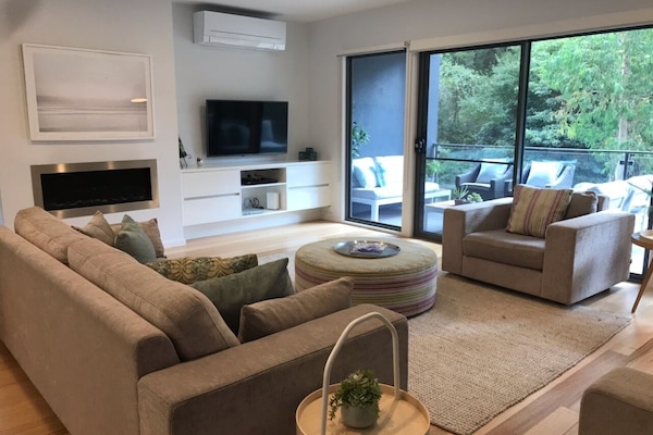 Lounge area with gas fire and TV
