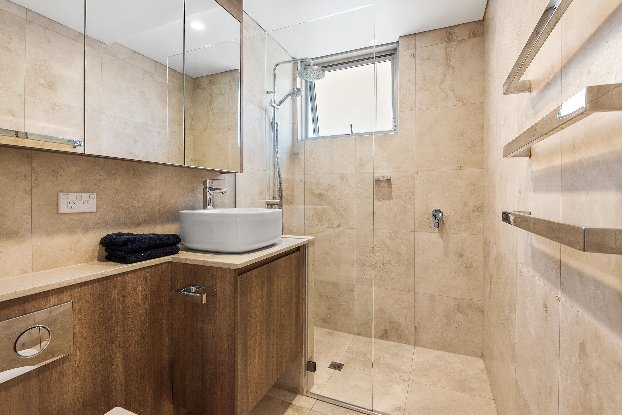 Shower, rainfall showerhead, hair dryer, towels