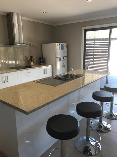 Located within walking distance to Beautiful Simms Cove in a quiet Cul-de-Sac 