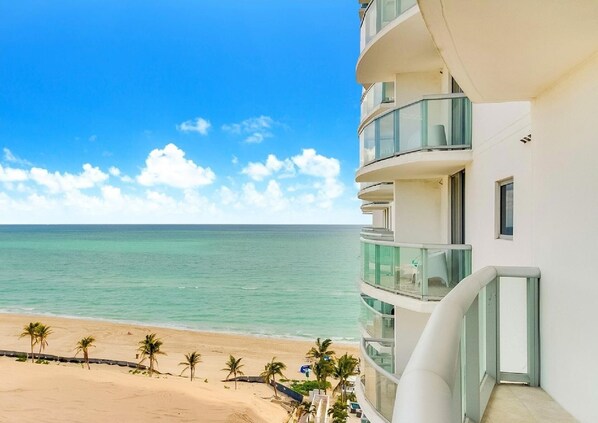 On the beach, sun loungers, beach towels