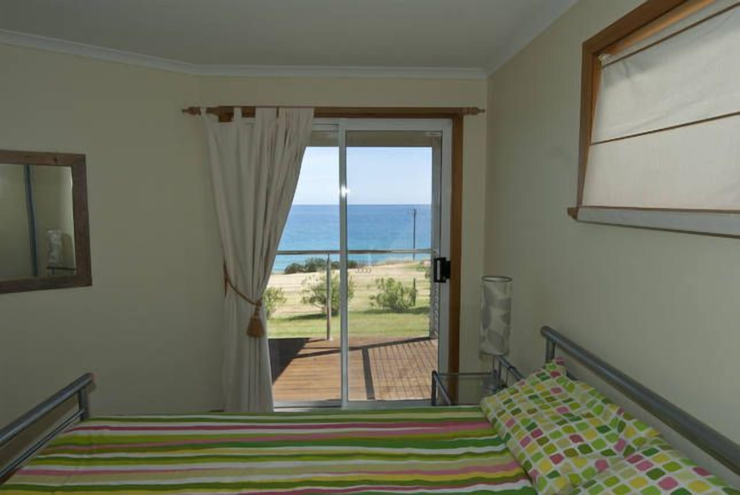 Main bedroom., queensize Sea views from bedroom and own balcony.