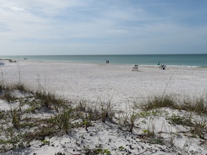 On the beach, sun-loungers, beach towels