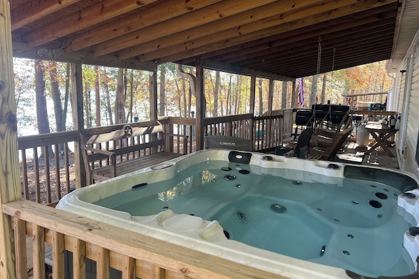 HOT TIUB with waterfront views and firepit views. RELAX