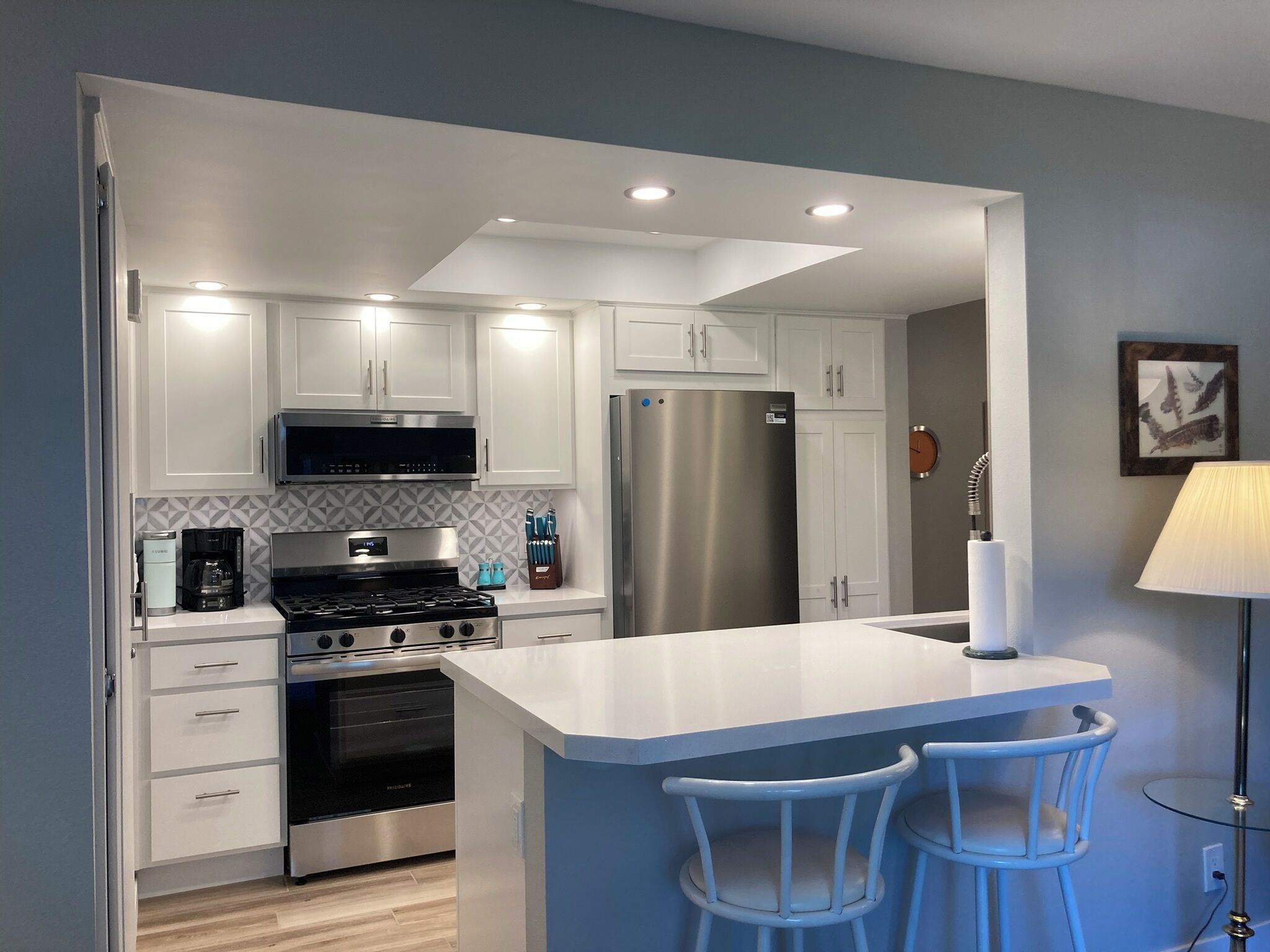 Fridge, microwave, oven, stovetop view of vacation home property