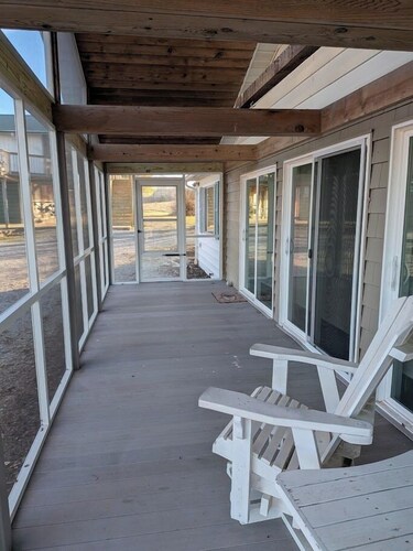 Relax at a cozy countryside retreat with a private hot tub, pond views & fire pit — pure bliss.