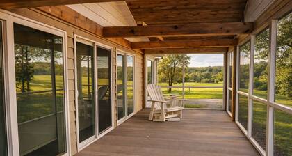 Relax at a cozy countryside retreat with a private hot tub, pond views & fire pit — pure bliss.