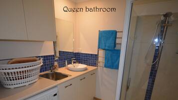 Hair dryer, slippers, towels, soap
